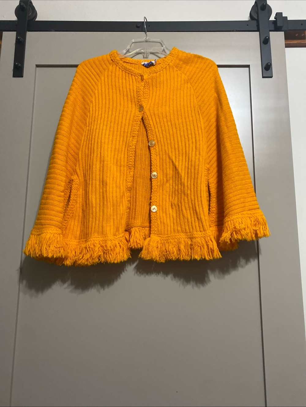 Fringe-Trim Knit Cape Shrug in Orange